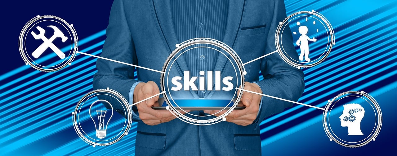man holding tablet titled training skills